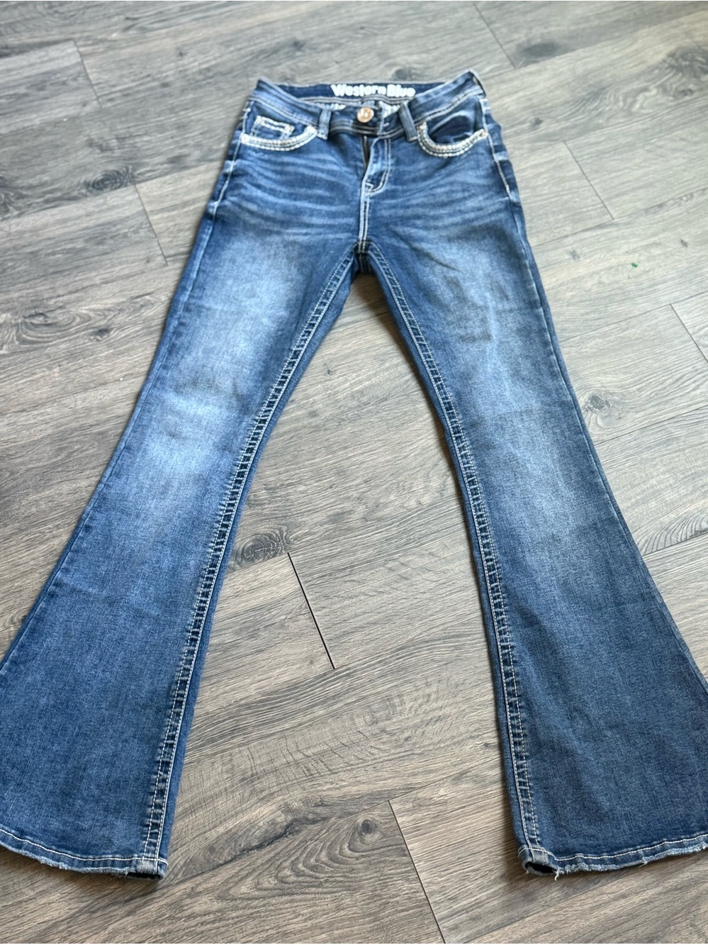 Western Blue women’s denim jeans with a flattering bootcut/flare leg and heavily